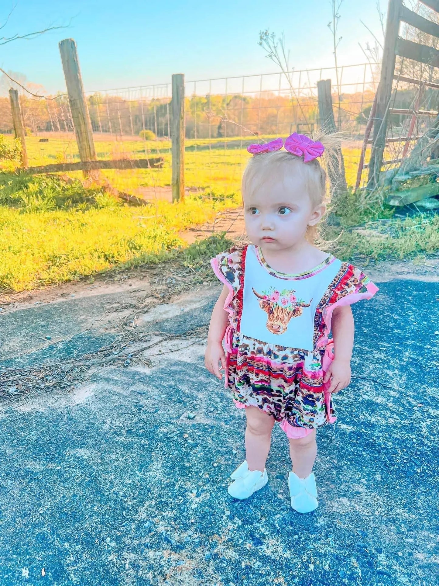 Pink serape cow romper - Get it from Bo