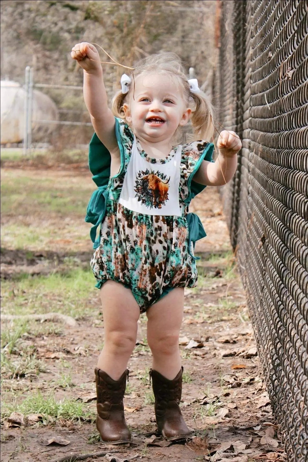 Turquoise cow romper - Get it from Bo