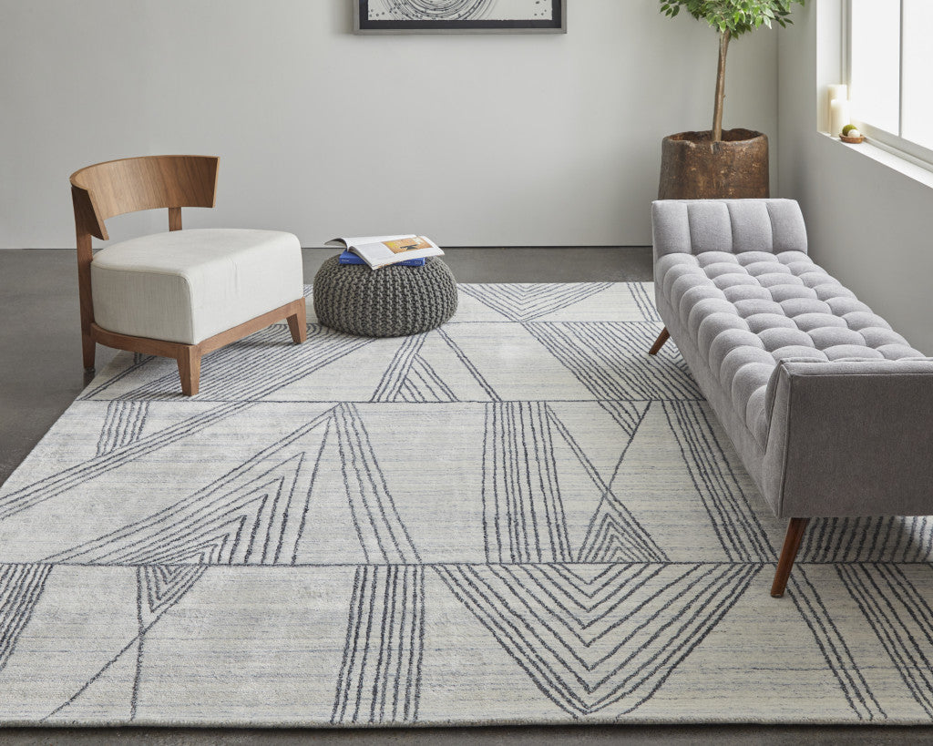2' X 3' Black and Ivory Abstract Hand Woven Area Rug