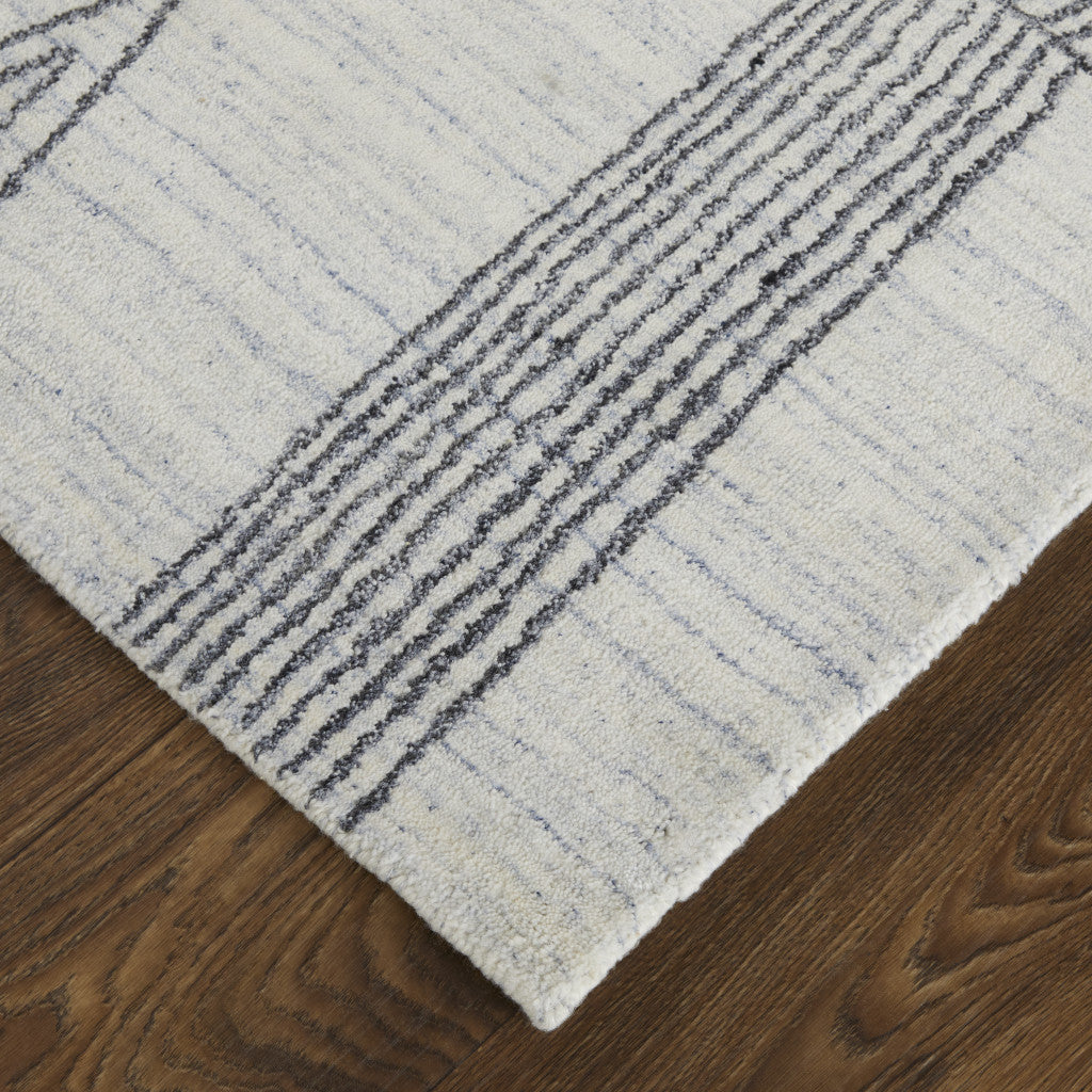 2' X 3' Black and Ivory Abstract Hand Woven Area Rug