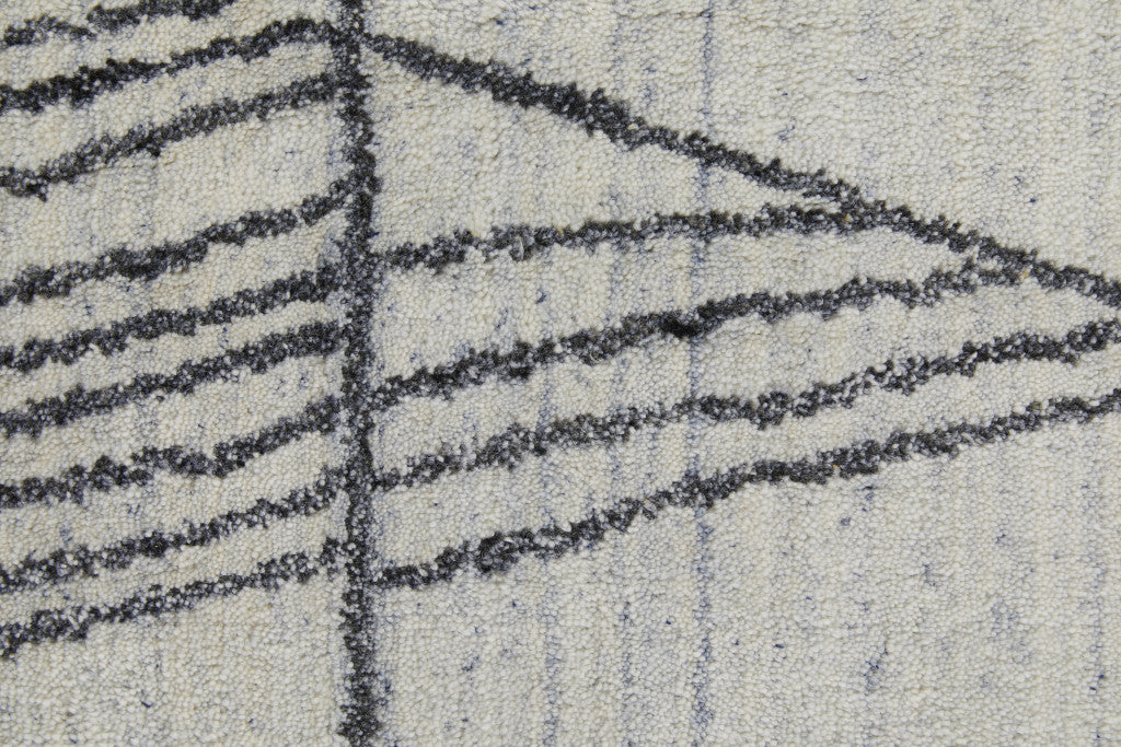 2' X 3' Black and Ivory Abstract Hand Woven Area Rug
