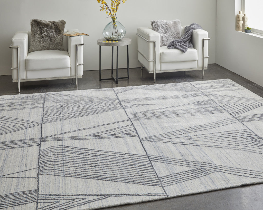 2' X 3' Black and Ivory Abstract Hand Woven Area Rug