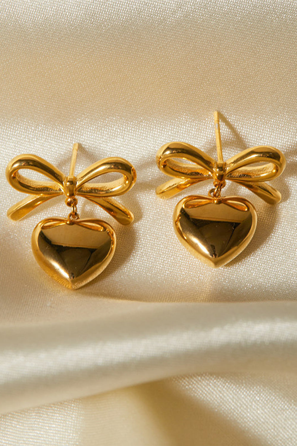 Gold Heart and Bow Studded Earrings