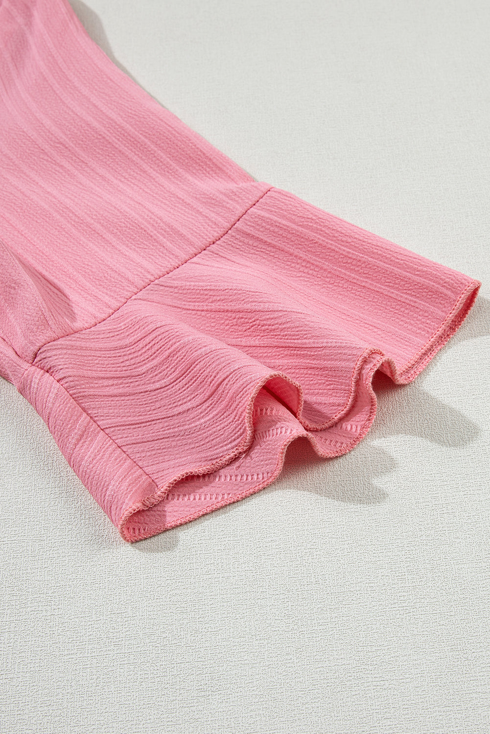 Capri Ruffled Half Sleeve V Neck Textured Top.