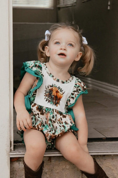 Turquoise cow romper - Get it from Bo
