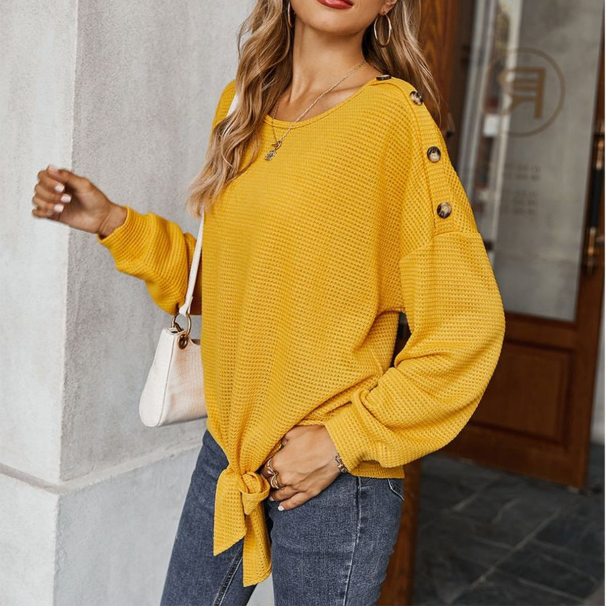 Long Sleeve Waffle Knit Pullover Top with Shoulder Button Detail and Front Tie Hem - Get it from Bo