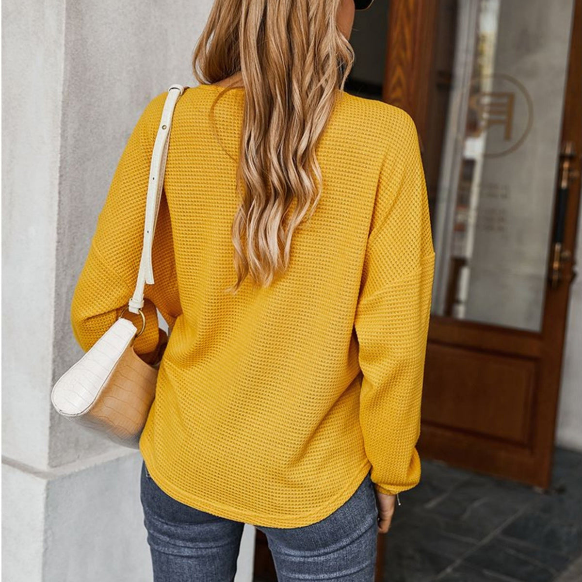 Long Sleeve Waffle Knit Pullover Top with Shoulder Button Detail and Front Tie Hem - Get it from Bo