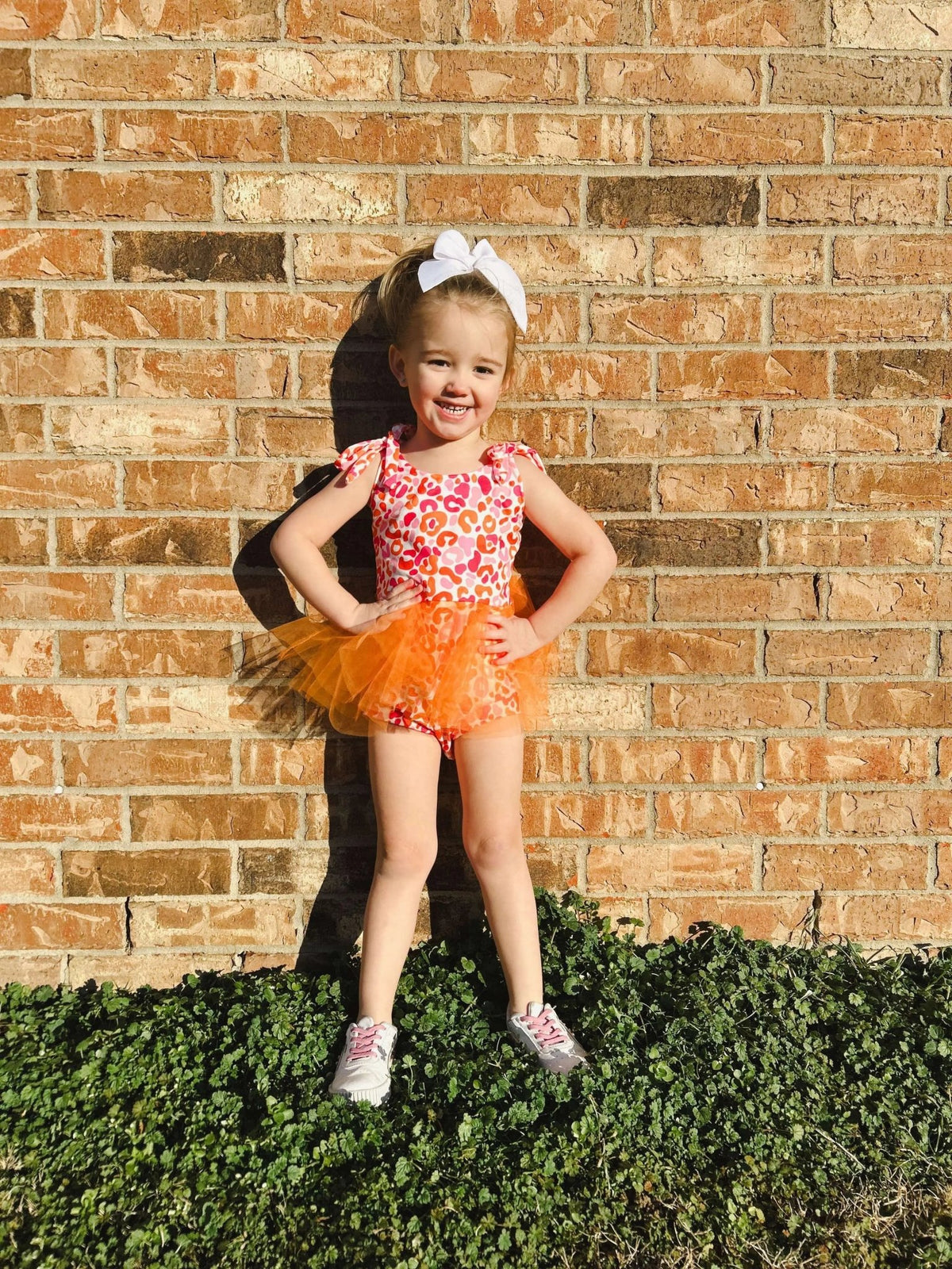 Orange and pink leopard mesh skirted romper - Get it from Bo
